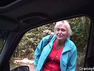 Mature blonde woman gets doggy-styled outdoors in a pickup truck
