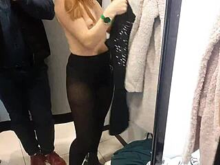First person view of a hot redhead with natural tits in the fitting room