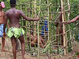 Naked slaves kept in a cage or worse