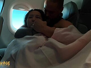 Asian babe gets fingered by friend on airplane mile high club adventure