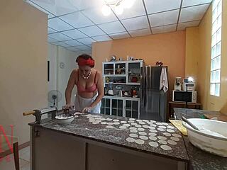 Nudist maid Regina Noir dominates in the kitchen as she makes dumplings